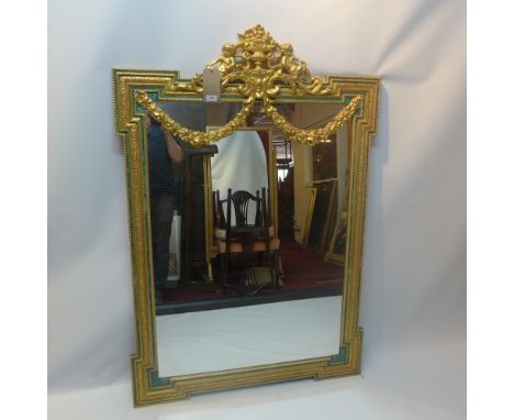 A Neo classical style gilt over mantle mirror with crest, H 148cm x W 100cm 