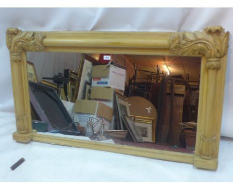 An early 20th Century French pine overmantle mirror with acanthus leaf design, 130cm x 74cm