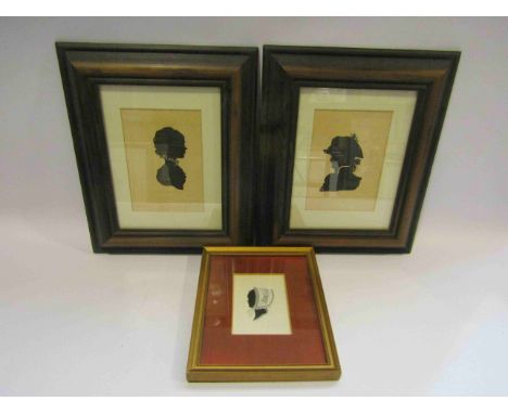 Three 19th Century portrait silhouettes on card, a lady with a ruffle collar 14cm x 9cm.  A young girl wearing a bonnet, mono
