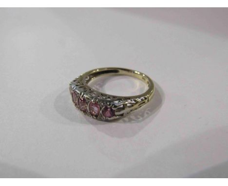 An 18ct pink sapphire and diamond half hoop ring. Size N