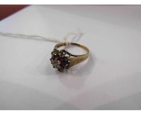 A ruby and diamond floral set ring, 9ct gold shank. Size Q