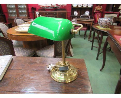 A green glass bankers lamp, 40cm tall