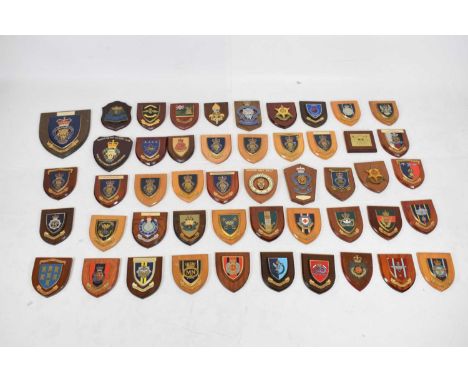 Quantity of military and civilian wooden mounted crests to include; Portsmouth F.E.P.O.W., Metropolitan Police, Royal Army Ed