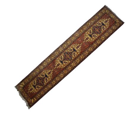 Middle Eastern wool runner, probably Anatolian Turkish, gold and blue ground outer border with red ground centre having three