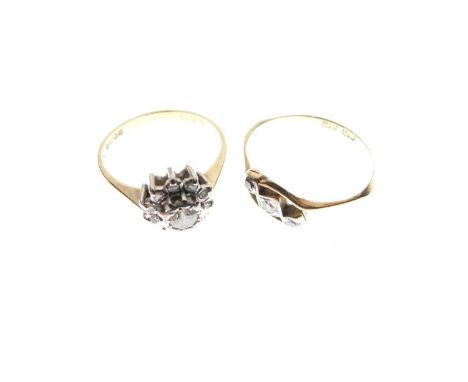 18ct gold platinum and diamond cluster ring, size N approx, together with yellow metal three stone diamond ring of crossover 