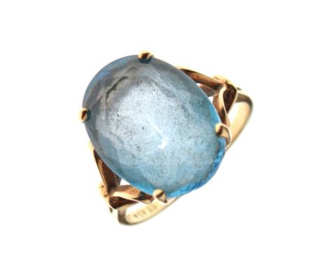 Dress ring set large facetted blue stone, the yellow metal shank stamped '14KT', size O approx, 6g gross approx