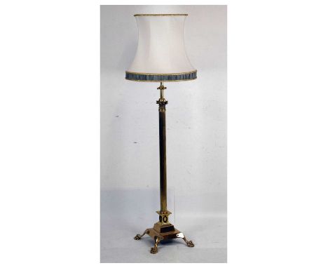 Early 20th Century brass standard lamp, of corinthian column form on stepped base with paw feet, 152cm high (inc. fitment)
