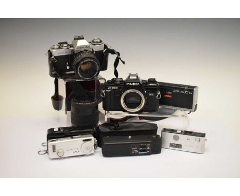 Quantity of Minolta accessories to include; Minolta - 16 MG Miniature , 16 Model P, 460Tx Pocket Autopak, AF Zoom 70-210, M-1