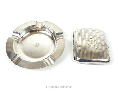 A sterling silver ashtray and cigarette case, the ashtray engraved centrally with a small letter 'B' in Gothic script, Maker: