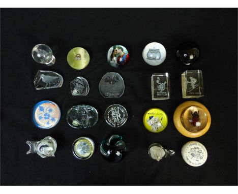 A collection of glass paperweights including a boxed Caithness example, Dartington Crystal and others.