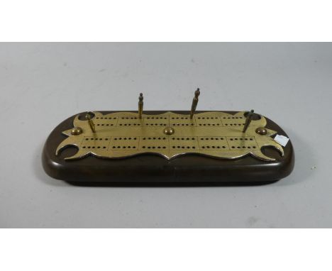 A Late Victorian Brass Mounted Cribbage Board with Four Pegs, 29cm Long 