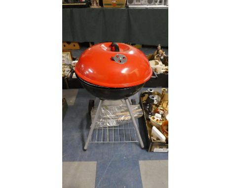A Kettle Barbecue on Stand with Tools 