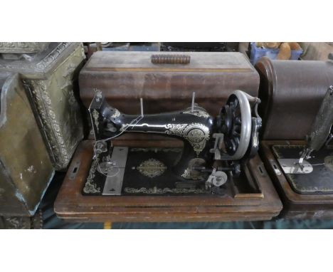 A Vintage Cased Collier Sewing Machine 