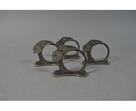 A Collection of Four Vintage Metal Napkin Rings in the Form of Bunny Rabbits 