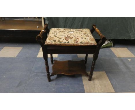 An Edwardian Oak Framed Lift Top Tapestry Seated Piano Stool 