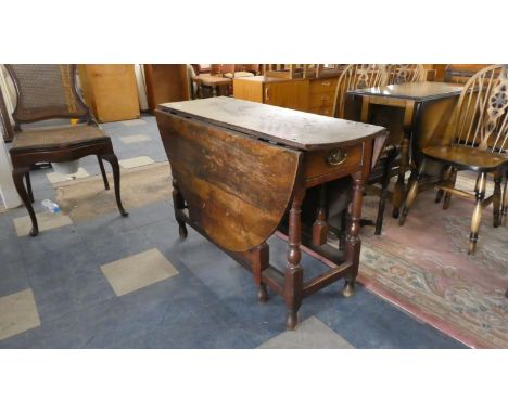 An Early 19th Century Oak Drop Leaf Gate Leg Table, 110cm Wide 