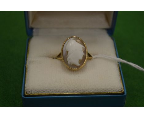 A 10ct gold ring mounted with a cameo size Q.