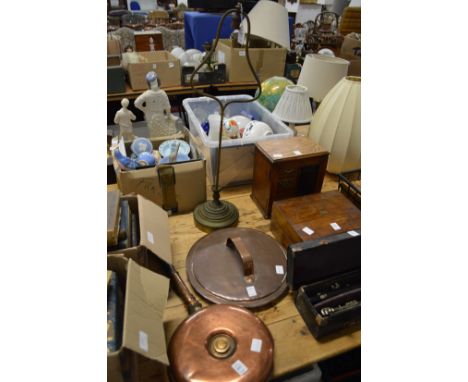 A copper bed warming pan, copper lid and a lamp base.