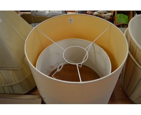 A large quantity of lamp shades.