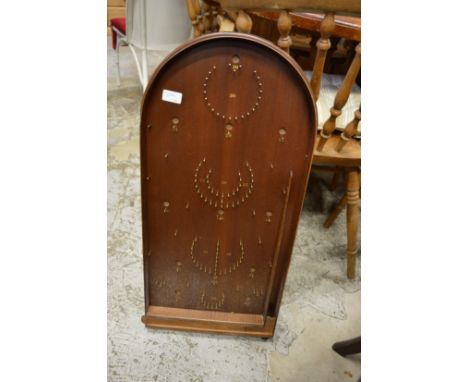A bagatelle board.