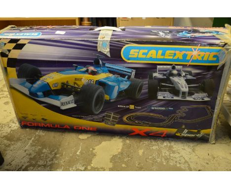 A boxed Scalextric set.