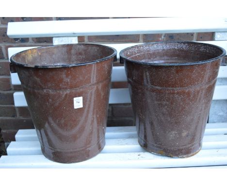 Two enamel buckets.