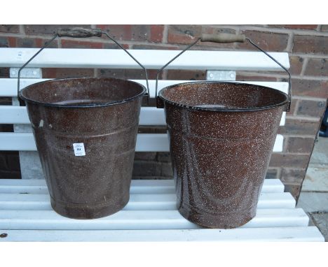 Two enamel buckets.