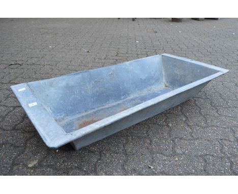 A galvanised rectangular planter/trough.
