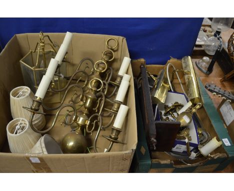 A set of four Dutch style brass two branch wall lights and other lighting.