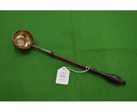 A coin inset silver toddy ladle.