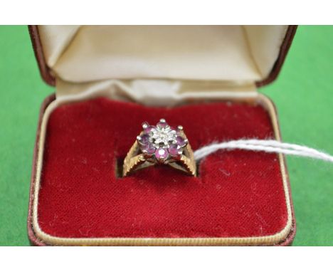 A small 9ct gold and gem set ring size H.