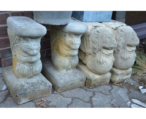 A pair of composite garden bench supports.