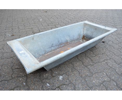 A galvanised rectangular planter/trough.
