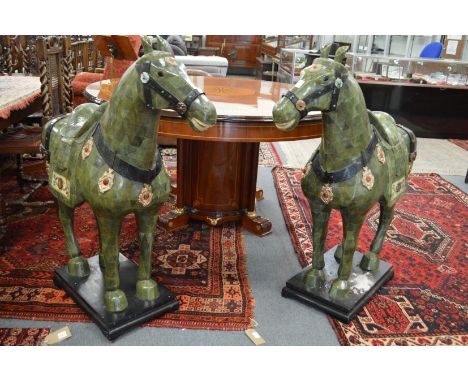 A good large and imposing pair of Chinese jade floor standing models of horses.