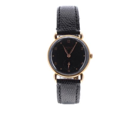 Patek Philippe 18ct gold gentleman's wristwatch, ref. 590, circa 1940s, the black dial with alternating rose dot markers and 