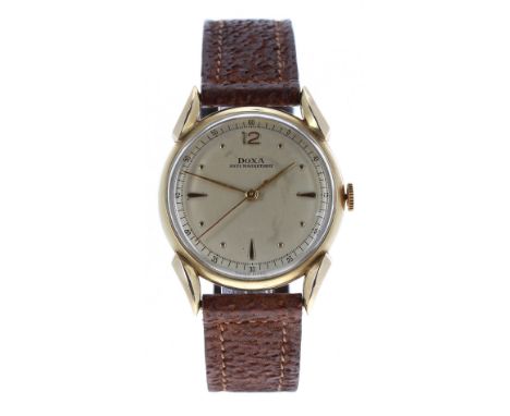 Doxa 14ct vintage gentleman's wristwatch, signed circular dial with Arabic twelve, dagger and dot markers with centre seconds