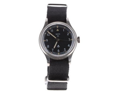 Smiths British Military Army issue stainless steel gentleman's wristwatch, circa 1968, circular black dial with Military arro