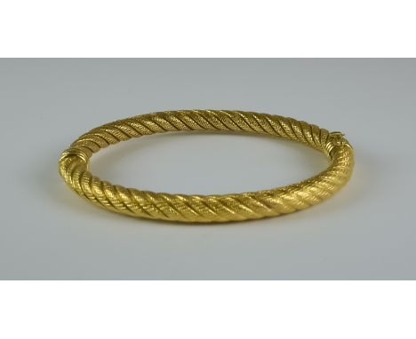 An 18ct Rope Twist Bangle, Modern, 215mm circumference, gross weight 14.5g