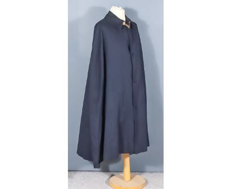 A Gentleman's Black Cloak, Early 20th Century, with gilt brass lion head clasps, and eight cotton and lace christening gowns 