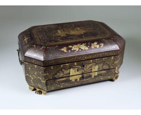 I* A Chinese Black Lacquer Octagonal Workbox, 19th Century, decorated in gilt with figures in landscapes, the interior with d