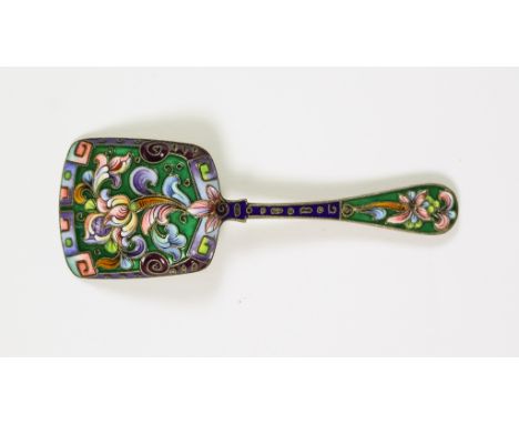 An Early 20th Century Continental Silvery Metal and Champleve Enamel Caddy Spoon, unmarked, decorated with stylized flowers a