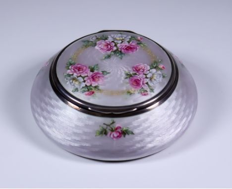 An Early 20th Century Silver, Silver Gilt and White Enamel Circular Box, Hallmarks rubbed but possibly by Cohen and Child's L
