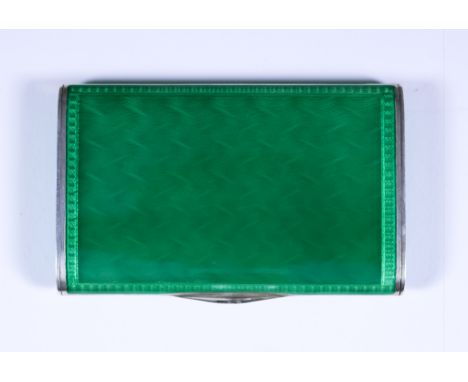 An Early 20th Century Continental Silver, Silver Gilt and Green Enamel Rectangular Snuff Box, with import mark for Cohen and 
