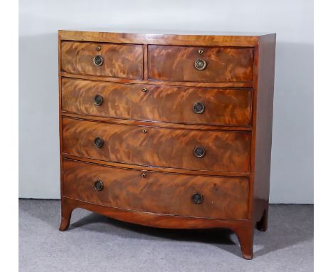 A Late Georgian Mahogany Bow Front Chest with square edge to top, fitted two short and three long drawers, with shaped apron 