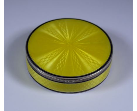 An Early 20th Century Swiss Silver and Yellow Enamel Circular Box, stamped 935 sterling, with guilloche enamel to lid and sid