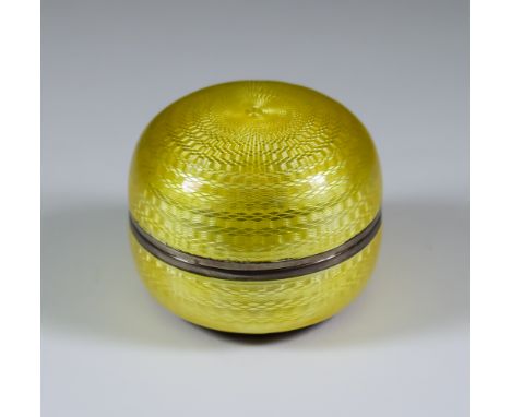 A George V Silver and Yellow Enamel Circular Box, possibly by Corke & Apthorp London 1926, the lid and sides with guilloche e