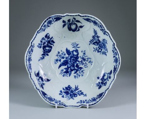 A Caughley Salad Bowl, Circa 1770, printed in blue with the "Pine Cone" pattern, the exterior printed with vegetables and but