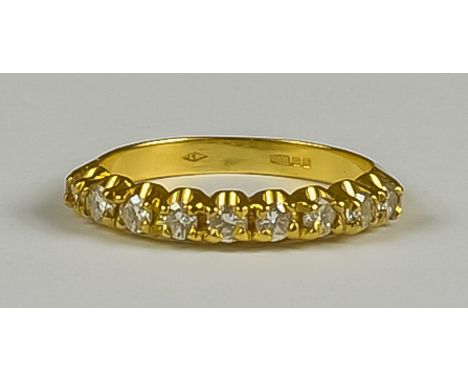 A Diamond Half Hoop Eternity Ring, Modern, 18ct gold set with nine small brilliant cut white diamonds, size K, gross weight 2