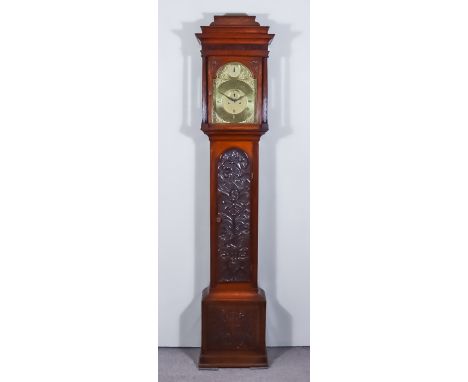 An 18th Century Oak Longcase Clock by Hindley of York, with 12ins arched brass dial with wide chapter ring, with Roman and Ar