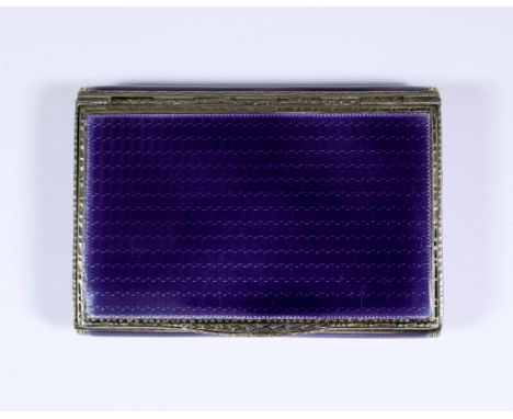 A George V Silver, Silver Gilt and Purple Rectangular Snuff Box, makers mark rubbed, Birmingham 1929, the whole with guilloch